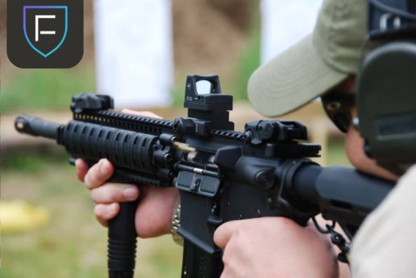man holding gun man holding gun
